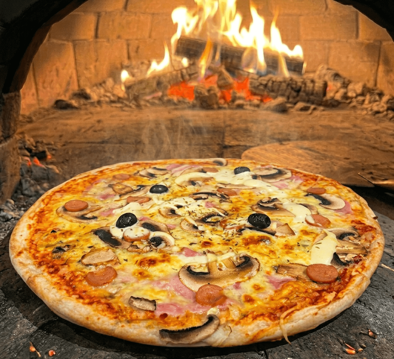 Pizzas spéciales signature Pizza Vroum — N'importe, Pile ou Face — feu de bois Castres